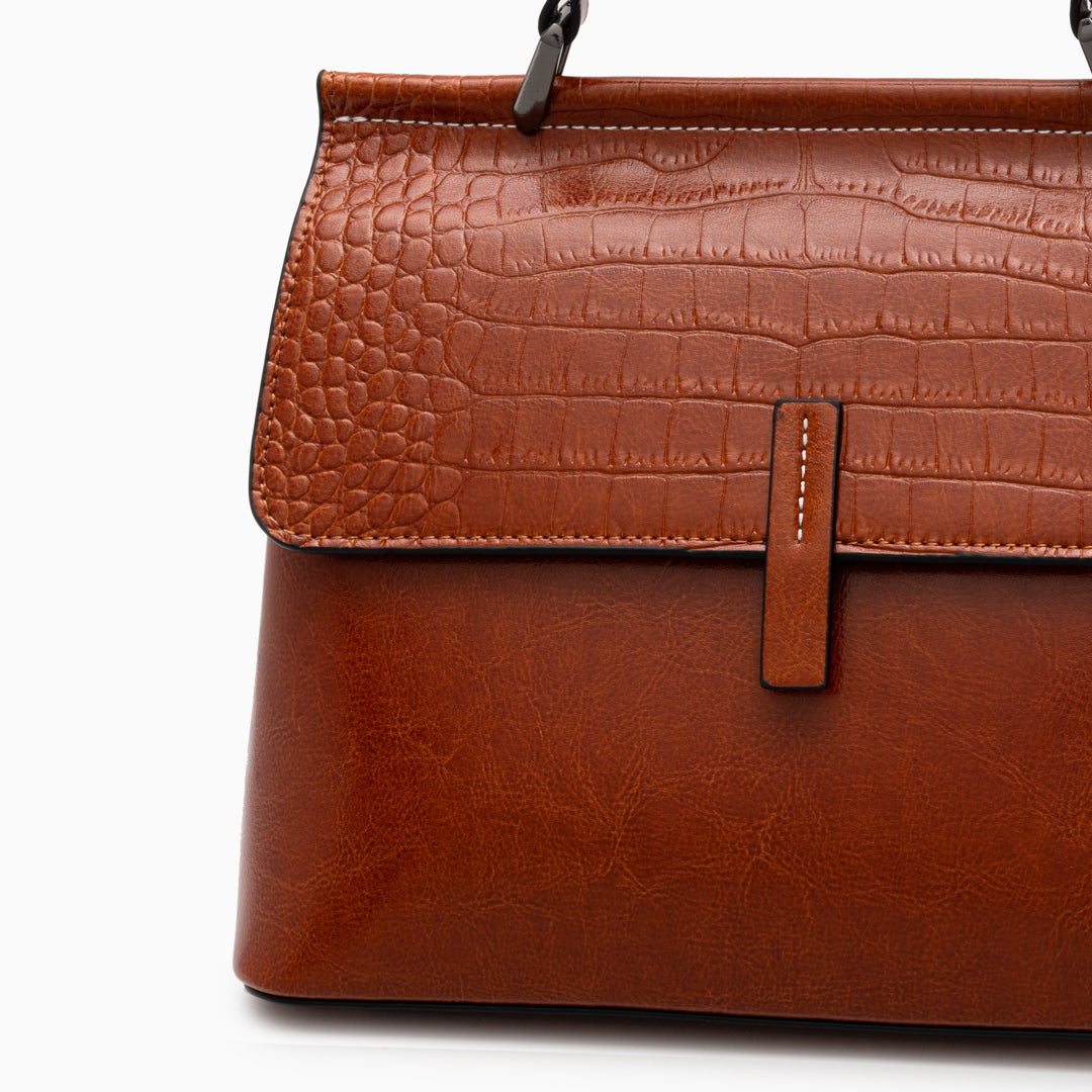 <tc>Bolso tipo cartera Kesha Croc </tc>