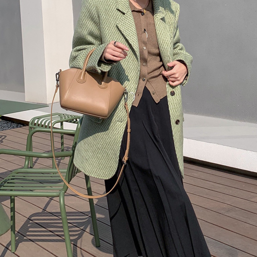 <tc>Bolso de mano Adelina Mini</tc>