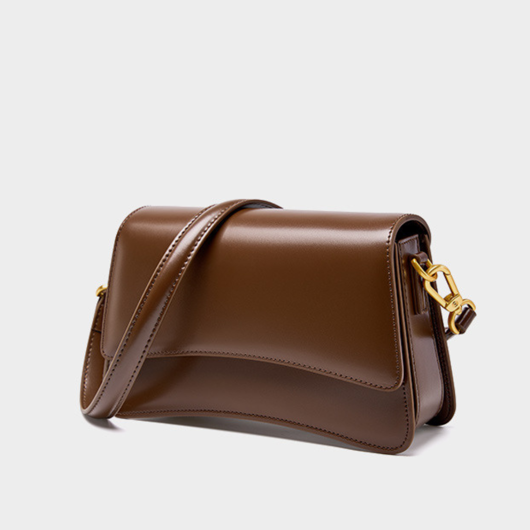 <tc>Bolso bandolera Britney de cuero liso</tc>